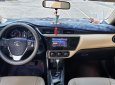 Toyota Corolla altis 1.8E CVT 2017 - Bán Toyota Corolla altis 1.8E CVT đời 2017, màu trắng, số tự động