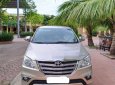 Toyota Innova 2.0E 2014 - Bán xe Toyota Innova 2.0E đời 2014, màu vàng, chính chủ