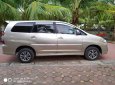 Toyota Innova 2.0E 2014 - Bán xe Toyota Innova 2.0E đời 2014, màu vàng, chính chủ