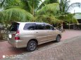 Toyota Innova 2.0E 2014 - Bán xe Toyota Innova 2.0E đời 2014, màu vàng, chính chủ