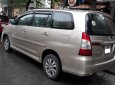 Toyota Innova E 2015 - Bán xe Toyota Innova E đời 2015, màu kem (be), còn mới