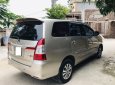 Toyota Innova 2.0E 2015 - Cần bán lại xe Toyota Innova 2.0E đời 2015, màu vàng, số sàn