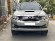 Toyota Fortuner 2016 - Gia đình cần bán xe Toyota Fotuner 2016, số sàn, màu bạc