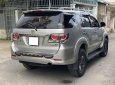 Toyota Fortuner 2016 - Gia đình cần bán xe Toyota Fotuner 2016, số sàn, màu bạc