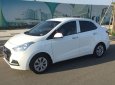 Hyundai Grand i10 2019 - Gia đình tôi cần bán Hyundai I10 2019, số sàn, màu trắng, sedan