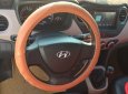 Hyundai Grand i10 2019 - Gia đình tôi cần bán Hyundai I10 2019, số sàn, màu trắng, sedan