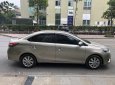 Toyota Vios 2015 - Chính chủ bán Vios E 2015, màu nâu vàng, gia đình sử dụng