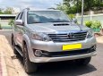 Toyota Fortuner 2016 - Nhà tôi cần bán Toyota Fortuner 2016, số sàn, máy dầu, màu bạc