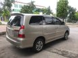 Toyota Innova 2016 - Nhà cần bán Innova 2016 số sàn, màu vàng ánh kim