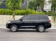 Toyota Land Cruiser 2015 - Nhà cần bán Toyota Lancuiser VX 2015, số tự động, màu đen