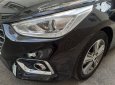 Hyundai Accent 2019 - Gia đình cần bán xe Hyundai Accent 2019 đk 2020 số tự động, màu đen huyền cực mới