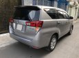 Toyota Innova 2017 - Gia đình cần bán xe Toyota Innova 2017 số sàn, màu bạc, còn mới tinh