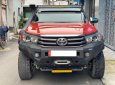 Toyota Hilux 2018 - Gia đình cần bán Hilux 2018, số tự động, máy dầu, màu cam độc quyền