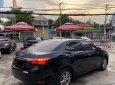 Toyota Corolla altis G 2016 - Cần bán xe Toyota Altis 1.8G 2016 màu đen chính hãng Toyota Sure