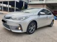 Toyota Corolla altis 1.8G 2018 - Cần bán xe Toyota Altis 1.8G AT 2018 màu bạc, xe đi ít giữ kĩ chính hãng Toyota Sure