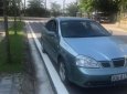 Daewoo Lacetti  1.8 MT 2004 - Cần bán gấp Daewoo Lacetti 1.8 MT sản xuất năm 2004, màu xanh lam, 94tr