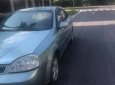 Daewoo Lacetti  1.8 MT 2004 - Cần bán gấp Daewoo Lacetti 1.8 MT sản xuất năm 2004, màu xanh lam, 94tr