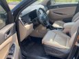Hyundai Tucson 2017 - Cần bán xe Hyundai Tucson sản xuất 2017, màu đen, giá chỉ 705 triệu