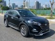 Hyundai Tucson 2017 - Cần bán xe Hyundai Tucson sản xuất 2017, màu đen, giá chỉ 705 triệu