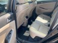 Hyundai Tucson 2017 - Cần bán xe Hyundai Tucson sản xuất 2017, màu đen, giá chỉ 705 triệu