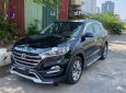 Hyundai Tucson 2017 - Cần bán xe Hyundai Tucson sản xuất 2017, màu đen, giá chỉ 705 triệu