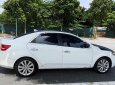 Kia Cerato   1.6AT  2010 - Bán xe Kia Cerato 1.6AT đời 2010, màu trắng, nhập khẩu nguyên chiếc số tự động giá cạnh tranh