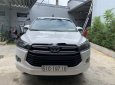 Toyota Innova 2.0E 2018 - Cần bán gấp Toyota Innova 2.0E đời 2018, màu trắng xe gia đình, giá 560tr