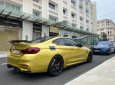 BMW M4   2017 - Bán ô tô BMW M4 đời 2017, màu vàng, xe nhập còn mới