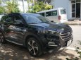 Hyundai Tucson     2019 - Cần bán gấp Hyundai Tucson sản xuất 2019, màu đen còn mới