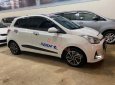 Hyundai Grand i10 1.2 AT  2018 - Cần bán lại xe Hyundai Grand i10 1.2 AT sản xuất năm 2018, màu trắng