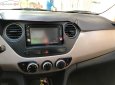 Hyundai Grand i10   2014 - Cần bán gấp Hyundai Grand i10 sản xuất 2014, màu trắng, nhập khẩu  