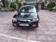 Mazda 323 2004 - Bán ô tô Mazda 323 2004, màu đen