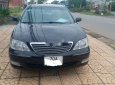 Toyota Camry 2002 - Cần bán gấp Toyota Camry đời 2002, màu đen