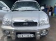 Hyundai Santa Fe   Gold   2004 - Bán Hyundai Santa Fe Gold đời 2004, màu bạc, xe nhập số tự động