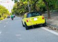 Mini Cooper 2006 - Cần bán xe Mini Cooper năm 2006, màu vàng, xe nhập