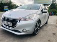 Peugeot 208 2013 - Cần bán gấp Peugeot 208 đời 2013, màu bạc, nhập khẩu nguyên chiếc còn mới