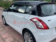 Suzuki Swift   1.4 AT  2015 - Cần bán xe Suzuki Swift 1.4 AT đời 2015, màu trắng