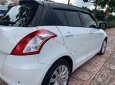 Suzuki Swift   1.4 AT  2015 - Cần bán xe Suzuki Swift 1.4 AT đời 2015, màu trắng