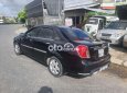 Daewoo Lacetti 2005 - Bán ô tô Daewoo Lacetti sản xuất 2005, màu đen còn mới, 110 triệu