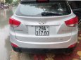 Hyundai Tucson   2.0 AT 4WD   2011 - Bán Hyundai Tucson 2.0 AT 4WD đời 2011, màu bạc, xe nhập  