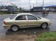 Kia Spectra   1.6 MT  2004 - Xe Kia Spectra 1.6 MT sản xuất năm 2004, màu vàng còn mới, 90 triệu