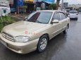 Kia Spectra   1.6 MT  2004 - Xe Kia Spectra 1.6 MT sản xuất năm 2004, màu vàng còn mới, 90 triệu