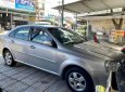 Daewoo Lacetti   EX  2010 - Cần bán lại xe Daewoo Lacetti EX đời 2010, màu bạc còn mới 