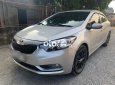 Kia K3 2015 - Cần bán gấp Kia K3 2015, màu ghi vàng