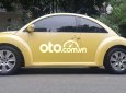 Volkswagen New Beetle   2007 - Cần bán xe Volkswagen New Beetle sản xuất 2007, màu vàng, nhập khẩu nguyên chiếc