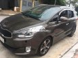 Kia Rondo 2015 - Bán Kia Rondo năm 2015, màu nâu, 495tr