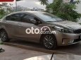 Kia K3   2016 - Bán Kia K3 đời 2016, màu nâu còn mới