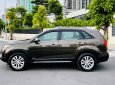 Kia Sorento   GAT 2.4L 4WD  2014 - Cần bán Kia Sorento GAT 2.4L 4WD đời 2014, màu nâu, giá 615tr