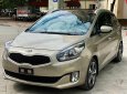 Kia Rondo   2.0 GATH  2015 - Bán Kia Rondo 2.0 GATH đời 2015, màu nâu còn mới, giá 480tr