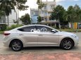 Hyundai Elantra  1.6 AT 2018 - Cần bán lại xe Hyundai Elantra 1.6 AT 2018, màu bạc giá cạnh tranh